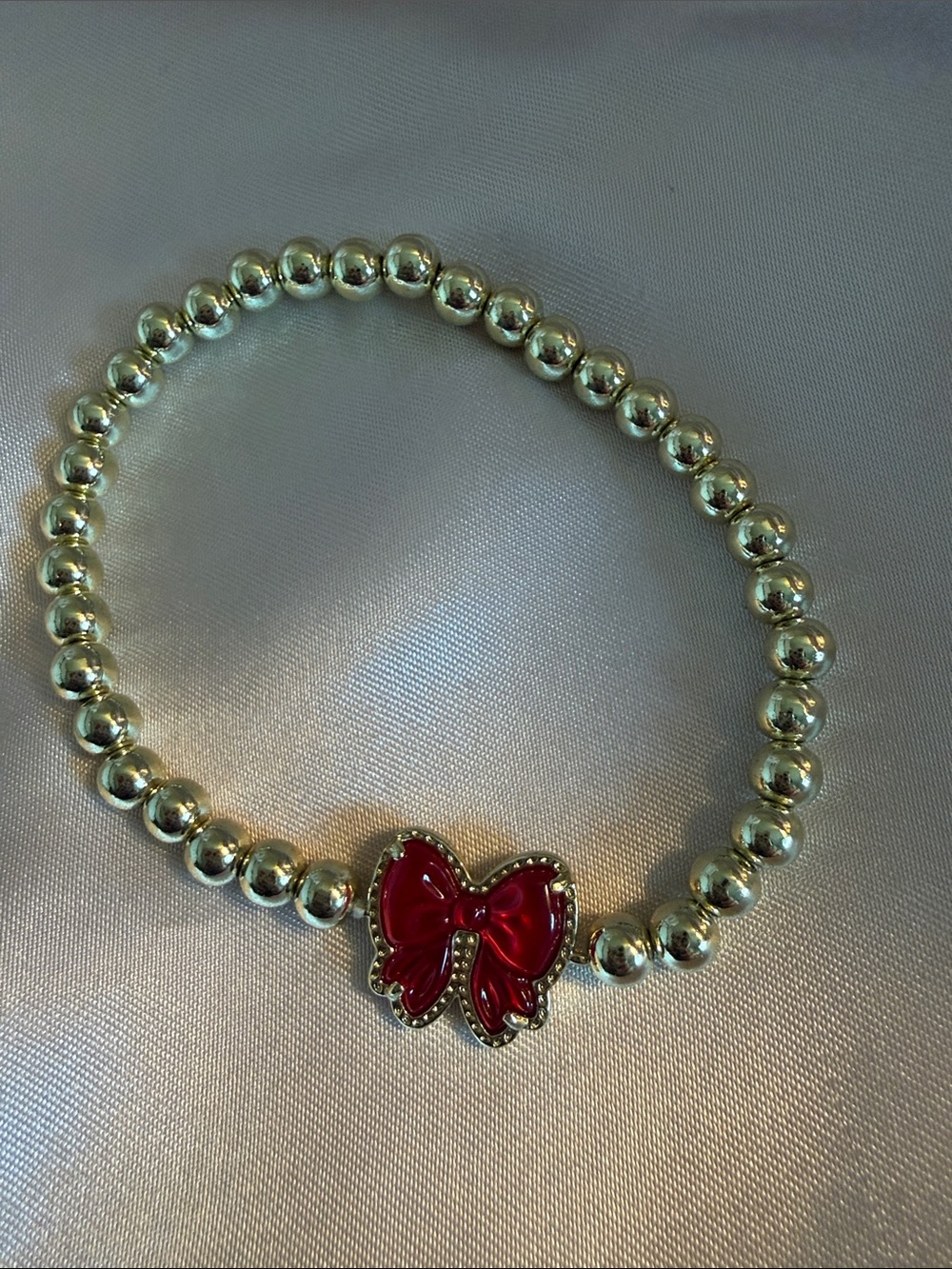 Kendra Scott gold Haley bow Beaded Bracelet with Red Bow Charm